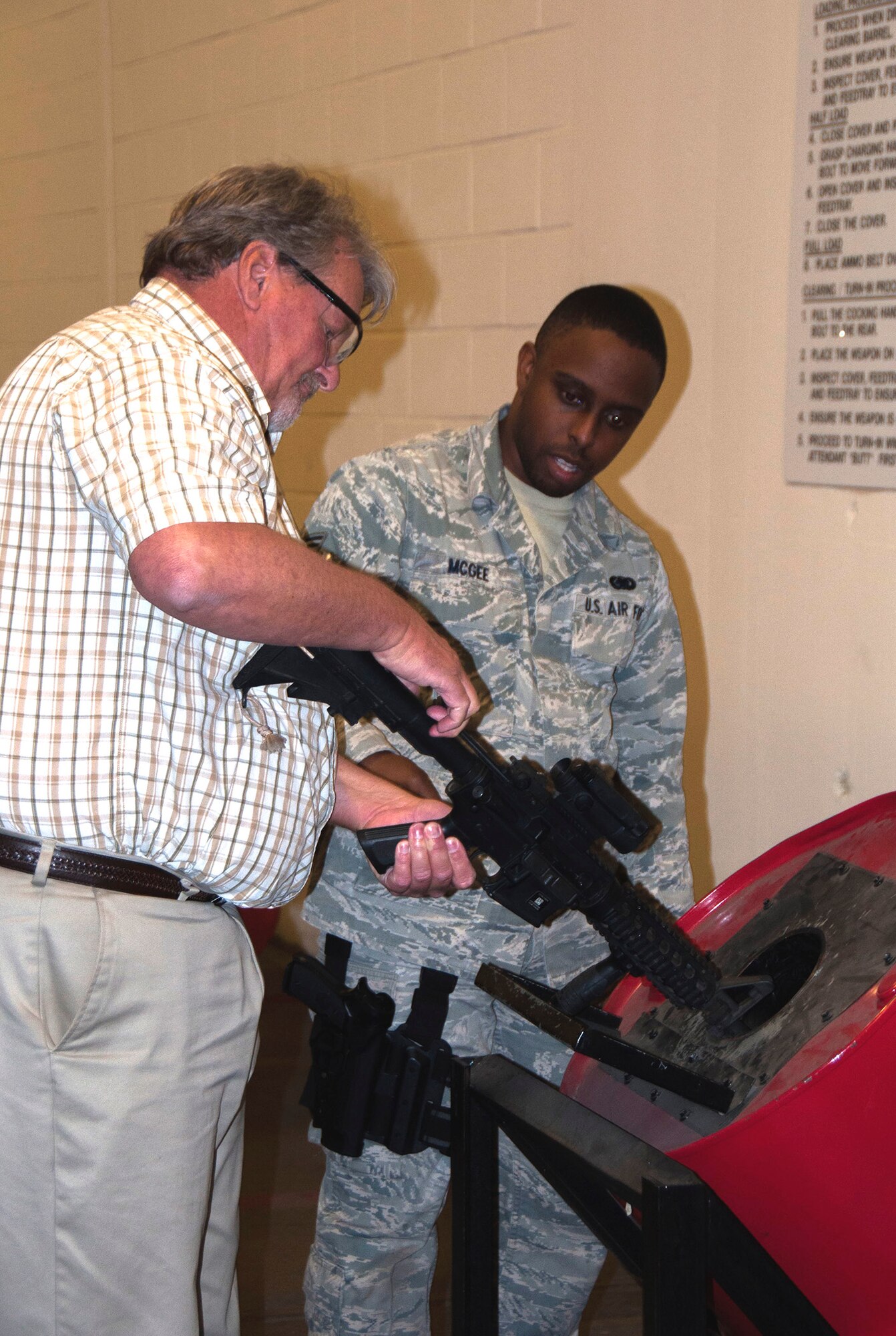 TRAVIS AIR FORCE BASE, Calif. -- Team Travis honorary commanders participated in a day-long Air Force Bootcamp to learn about military culture, April 3, 2014. The honorary commanders program pairs a local business leader with a unit commander to serve as that units’ “honorary commander.” The pairing is designed to maintain a solid, mutually beneficial relationship between the public and Team Travis. (U.S. Air Force photo/Staff Sgt. Cindy G. Alejandrez) 