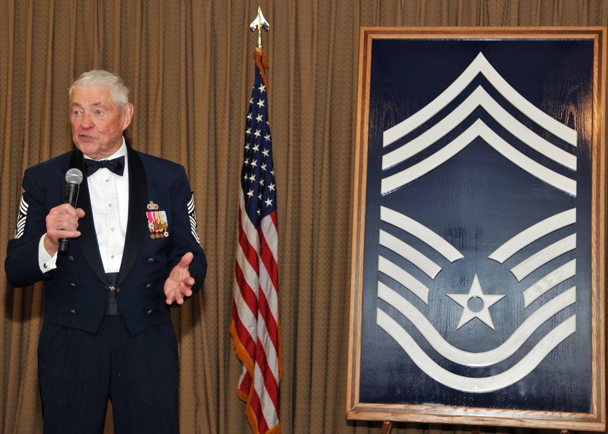 Retired Chief Master Sgt. Robert Gaylor, the fifth Chief Master Sergeant of the Air Force, speaks at a chief’s recognition ceremony on March 28, 2014, at the Northern Lights Club on Grand Forks Air Force Base, N.D.  Gaylor spoke about his own promotion to chief and the obstacles he faced afterwards. (U.S. Air Force photo/Senior Airman Xavier Navarro)