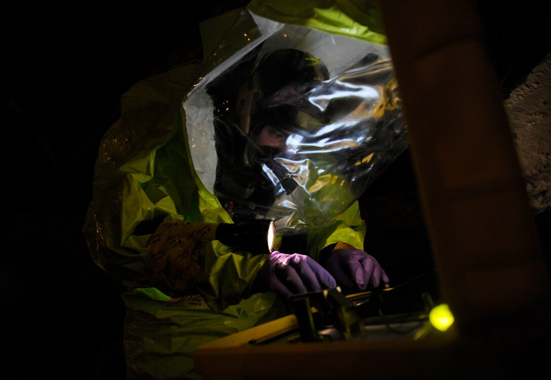 Senior Airman Anthony Ramirez, 482nd Civil Engineer Squadron emergency management journeyman, tests chemical agents during Black Flag training exercises at the Center for National Response in W.Va., March 27, 2014. Teams of bioenvironmental engineers, emergency management specialists and firefighters went through various scenarios throughout Black Flag, a two-week training course to detect trace chemical and biological agents. (U.S. Air Force Photo/ Airman 1st Class Nesha Humes)