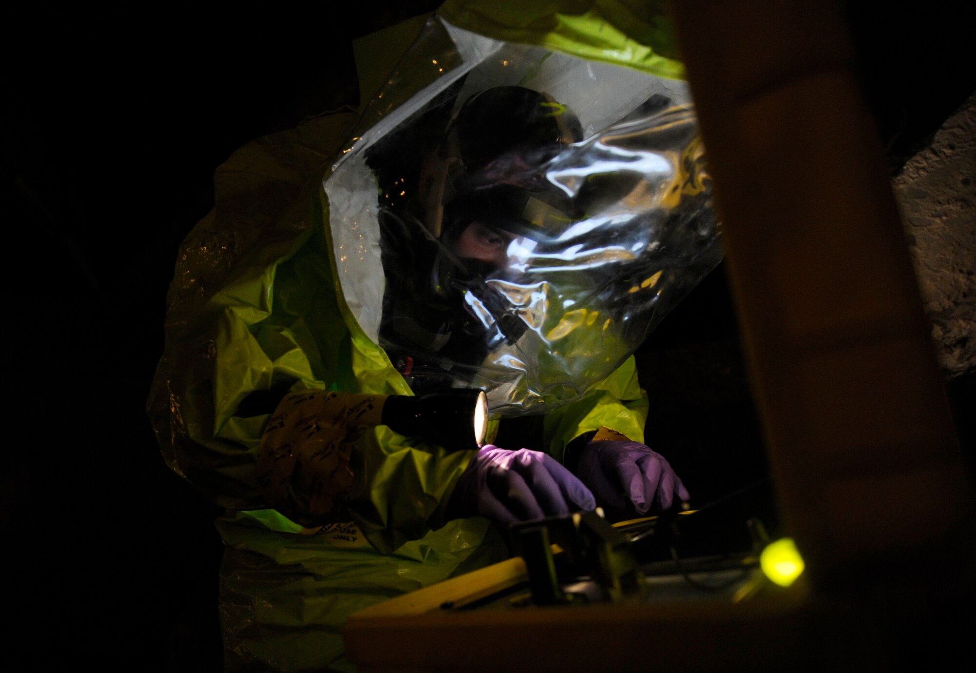 Senior Airman Anthony Ramirez, 482nd Civil Engineer Squadron emergency management journeyman, tests chemical agents during Black Flag training exercises at the Center for National Response in W.Va., March 27, 2014. Teams of bioenvironmental engineers, emergency management specialists and firefighters went through various scenarios throughout Black Flag, a two-week training course to detect trace chemical and biological agents. (U.S. Air Force Photo/ Airman 1st Class Nesha Humes)