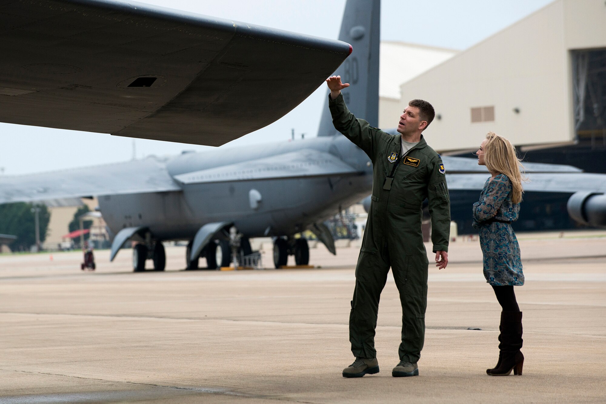 U.S. Air Force Capt. Jason Clendenin gives his wife Erin, a tour of a B-52H Stratofortress following his graduation ceremony from the Formal Training Unit (FTU), April 2, 2014, Barksdale Air Force Base, La. The FTU is comprised of the 93rd and 11th Bomb Squadrons and provides B-52 initial qualification training for all Air Force and Reserve aircrew members. (U.S. Air Force photo by Master Sgt. Greg Steele/Released)