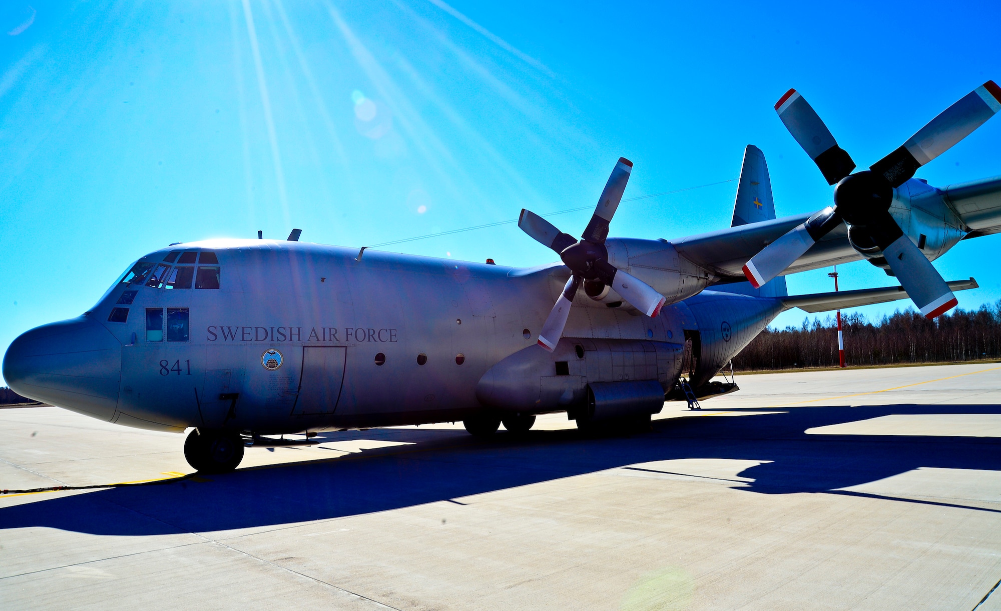 A Swedish air force C-130 sits on the flightline after participating in the 17th Baltic Region Training Event at Šiauliai Air Base, Lithuania, April 1, 2014. The event took place in the skies over the Baltic region to sharpen the skills of aircrews and air controllers from the U.S., Lithuanian and Swedish air forces. The event is designed to enhance the interoperability between allied partners in NATO and its Partnership for Peace program. (U.S. Air Force photo by Airman 1st Class Dana J. Butler/Released)