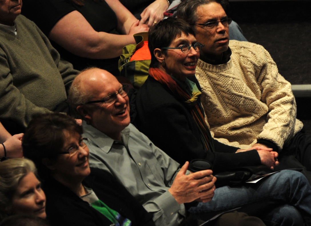 Audience members react to a performance by Senior Master Sgt. Robert Harrelson and Master Sgt. Eric Sullivan Jr. perform during a concert featuring the U.S. Air Force Band’s Concert Band and Singing Sergeants at here at the College of DuPage in Glen Ellyn, Ill, April 4, 2014. The performance at the College of DuPage kicks off the band’s 2014 Spring Tour spanning three states. (U.S. Air Force photo/Master Sgt. Tammie Moore)