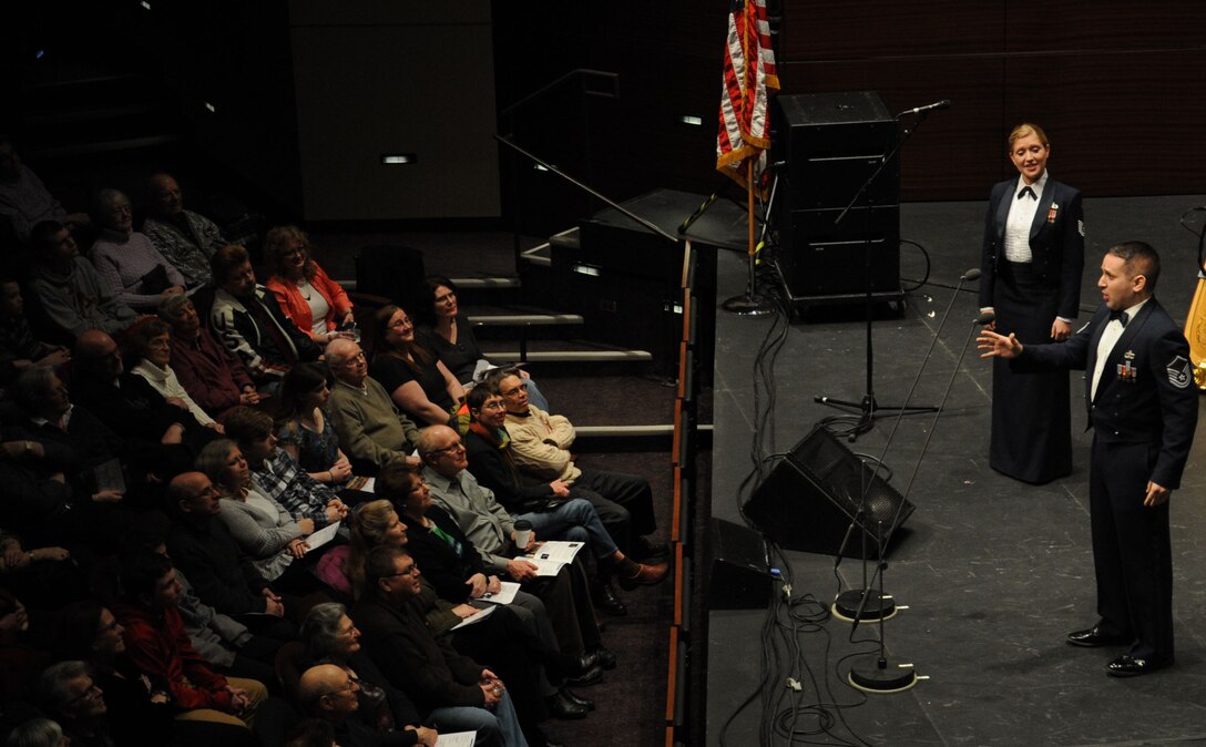 Master Sgt. Joseph Haughton and Tech. Sgt. Mandi Harper perform during a concert featuring the U.S. Air Force Band’s Concert Band and Singing Sergeants at the College of DuPage in Glen Ellyn, Ill, April 4, 2014. Haughton, a native of Philadelphia, is a tenor vocalist. Harper, a native of Columbus, Ohio, is a soprano vocalist. (U.S. Air Force photo/Master Sgt. Tammie Moore)