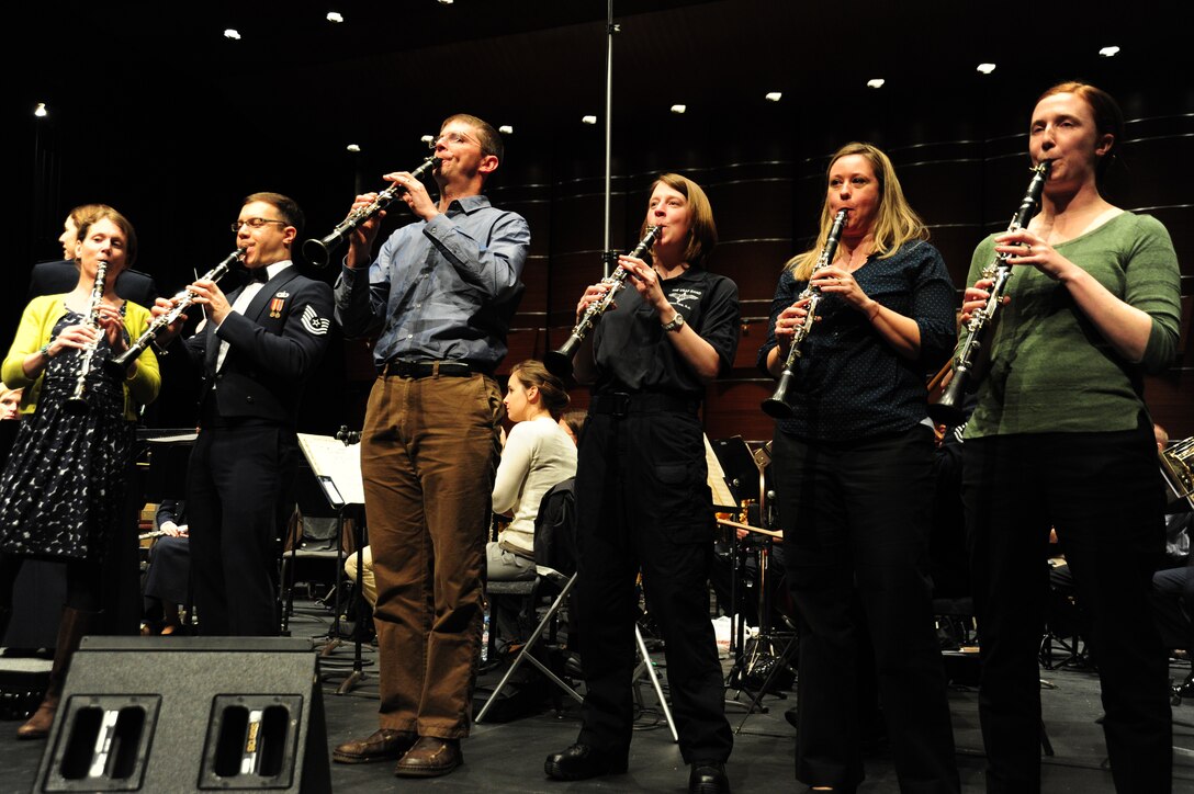 Airmen in the clarinet section of the U.S. Air Force Band rehearse for the first concert of their 2014 Spring Tour at the College of DuPage in Glen Ellyn, Ill, April 4, 2014. The clarinets show off their section’s skills during a featured group performance during the show. (U.S. Air Force photo/Airman 1st Class Joshua R. M. Dewberry)