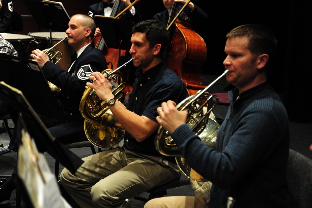 Airmen in the french horn section of the U.S. Air Force Band rehearse for the first concert of their 2014 Spring Tour at the College of DuPage in Glen Ellyn, Ill, April 4, 2014. The five person section is a just a fraction of the approximately 70 person band on tour. (U.S. Air Force photo/Airman 1st Class Joshua R. M. Dewberry)