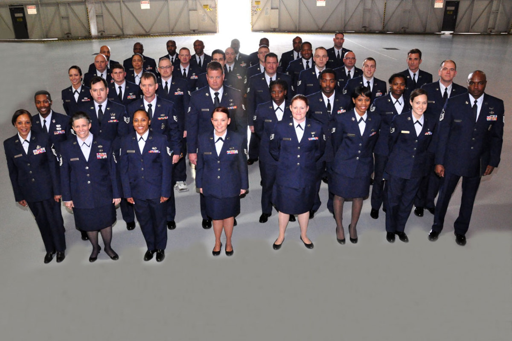 Recently promoted 94th Airlift Wing Staff Sgts. and Master Sgts. were recognized during a NCO and SNCO Induction Ceremony at Dobbins Air Reserve Base Hangar 5, March 2. The event was hosted by the Dobbins 56 Group and Top Three Organization. (U.S. Air Force photo illustration/Staff Sgt. Karla Lehman)