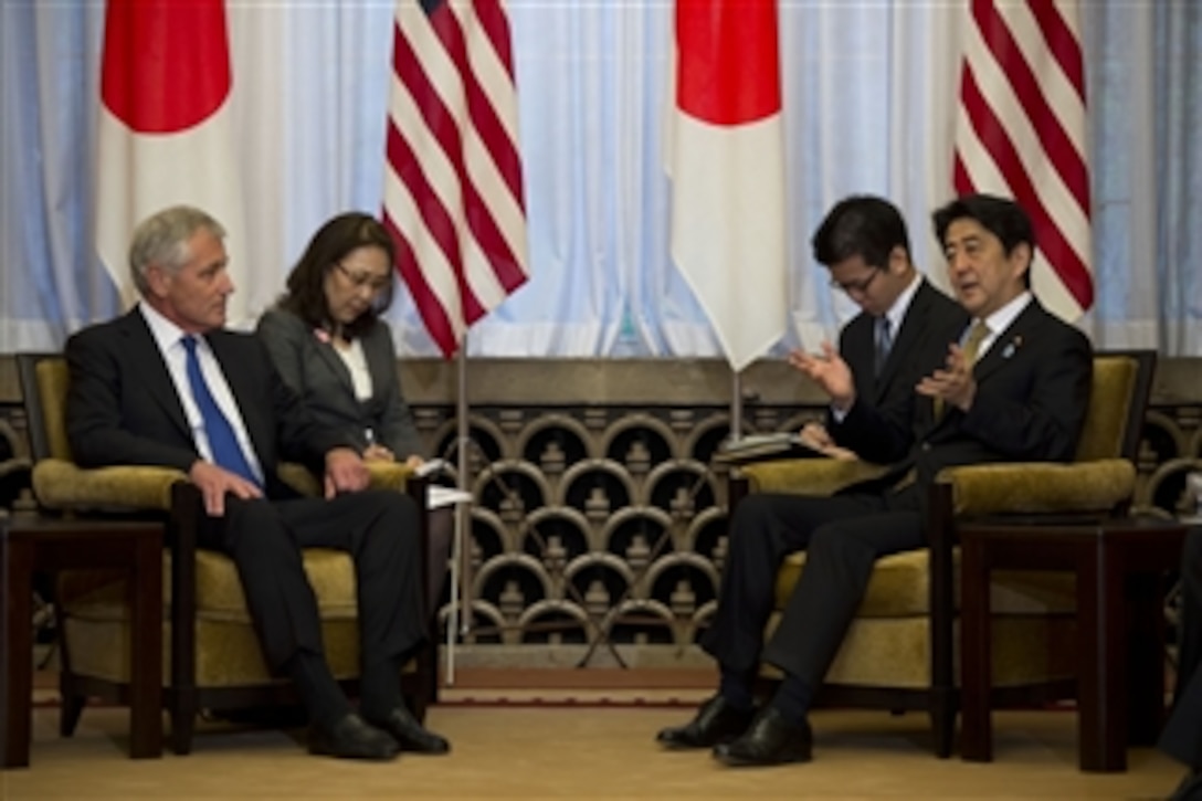 U.S. Defense Secretary Chuck Hagel, left, meets with Japanese Prime Minister Shinzo Abe at Sori Daijin Kantei, the prime minister's official residence, in Tokyo, April 5, 2014. Hagel and Abe discussed issues of mutual importance.
