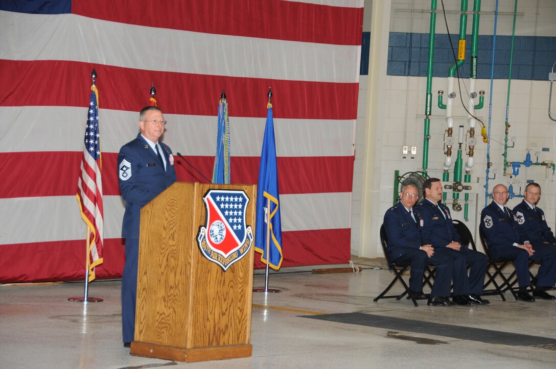 U. S. Air Force Command Chief Master Sgt. Andrew Papania, Command Chief, Mississippi Air National Guard, speaks to wing members, distinguished guests, and family members on Key Field Air National Guard Base, April 6, 2014. Papania spoke about the responsibilities of the Wing Command Chief Master Sergeant of the 186th Air Refueling Wing and the selection process.  (U. S. Air National Guard Photo by Tech. Sgt. Richard L. Smith/Released)