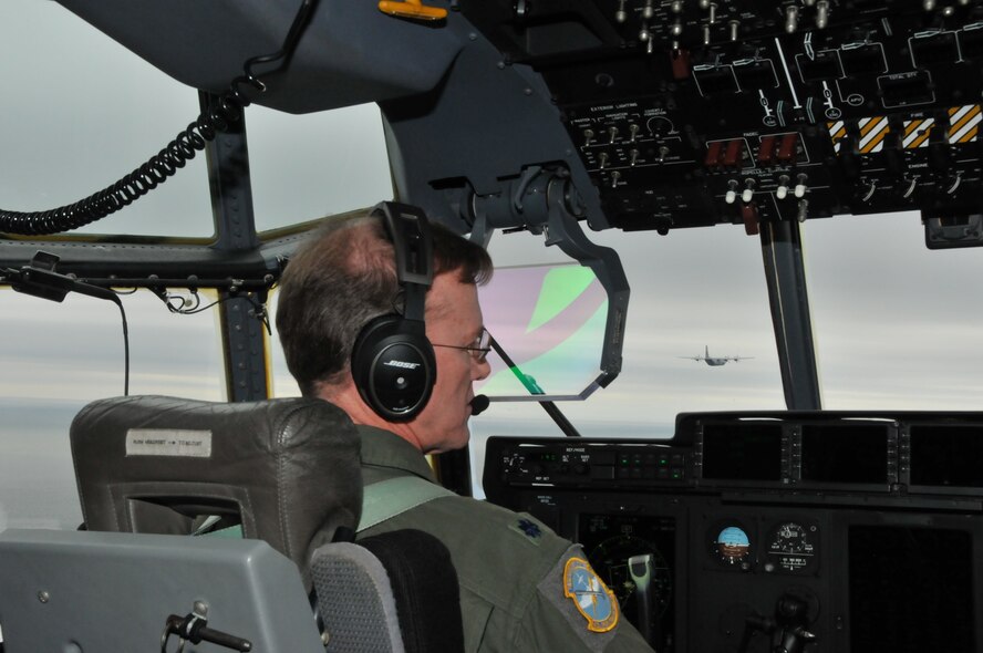 Lt. Col. Tim Weiher, pilot assigned to 403 Operation Support Squadron, follows the lead aircraft during takeoff and in formation during Operation Surge Capacity here April, 5, 2014.  Sixteen aircraft from the 403rd Wing participated in Operation Surge Capacity, a large scale training exercise designed to test the multiple capabilities of the wing. (U.S. Air Force Photo/Senior Airman Nicholas Monteleone)