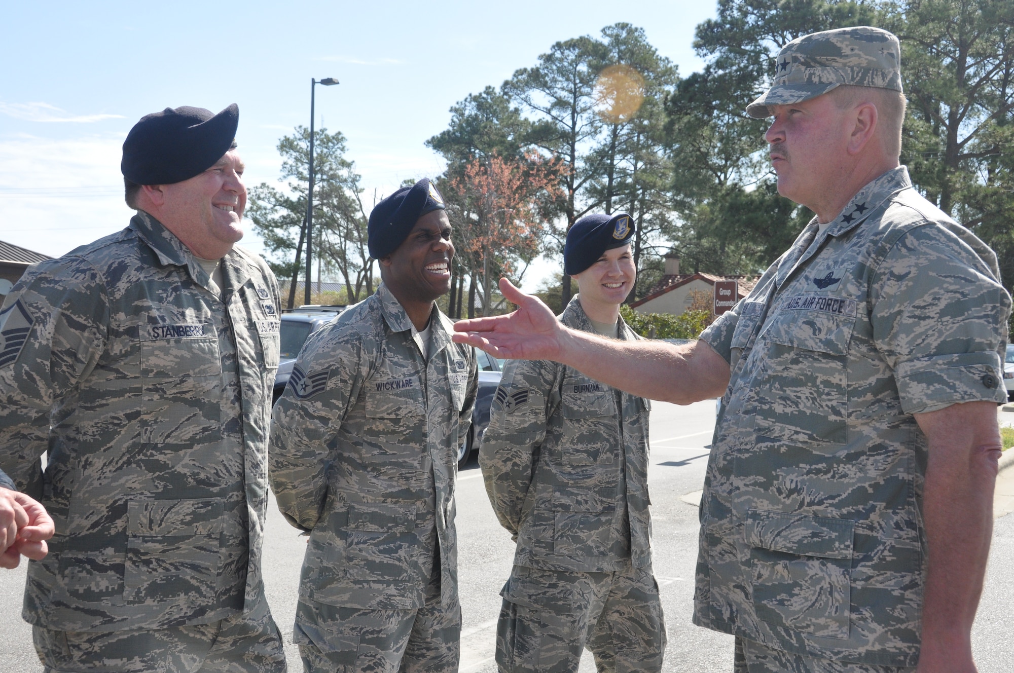 Maj. Gen. Mark Kyle, 22nd Air Force commander, jokes around with Airmen from the 440th Security Forces Squadron April 5 at Pope Field. Security Forces was one of several units that Maj. Gen. Kyle visited during his two day visit. (U.S. Air Force photo by: Senior Airman Melissa Dearstone)