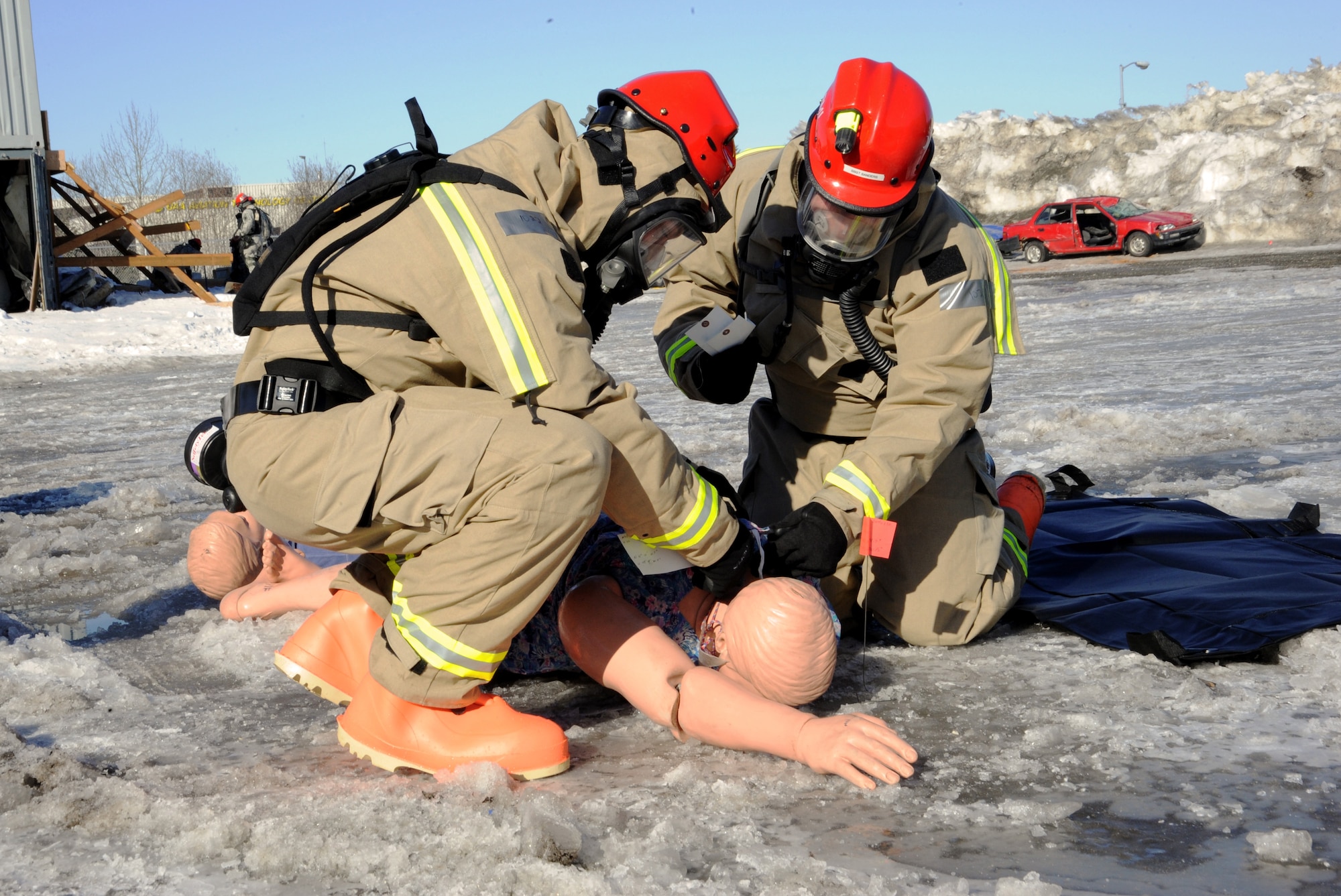 Members of the Oregon and Hawaii National Guard’s CBRNE Enhanced Response Force Package (CERFP) Fatality Search and Recovery Team, begin the dignified process to recover the remains of a simulated casualty during the Vigilant Guard-Alaska 2014 exercise, near Joint Base Elmendorf-Richardson, Anchorage, Alaska, March 30, 2014. (U.S. Air National Guard photo by Tech. Sgt. John Hughel, 142nd Fighter Wing Public Affairs/Released)