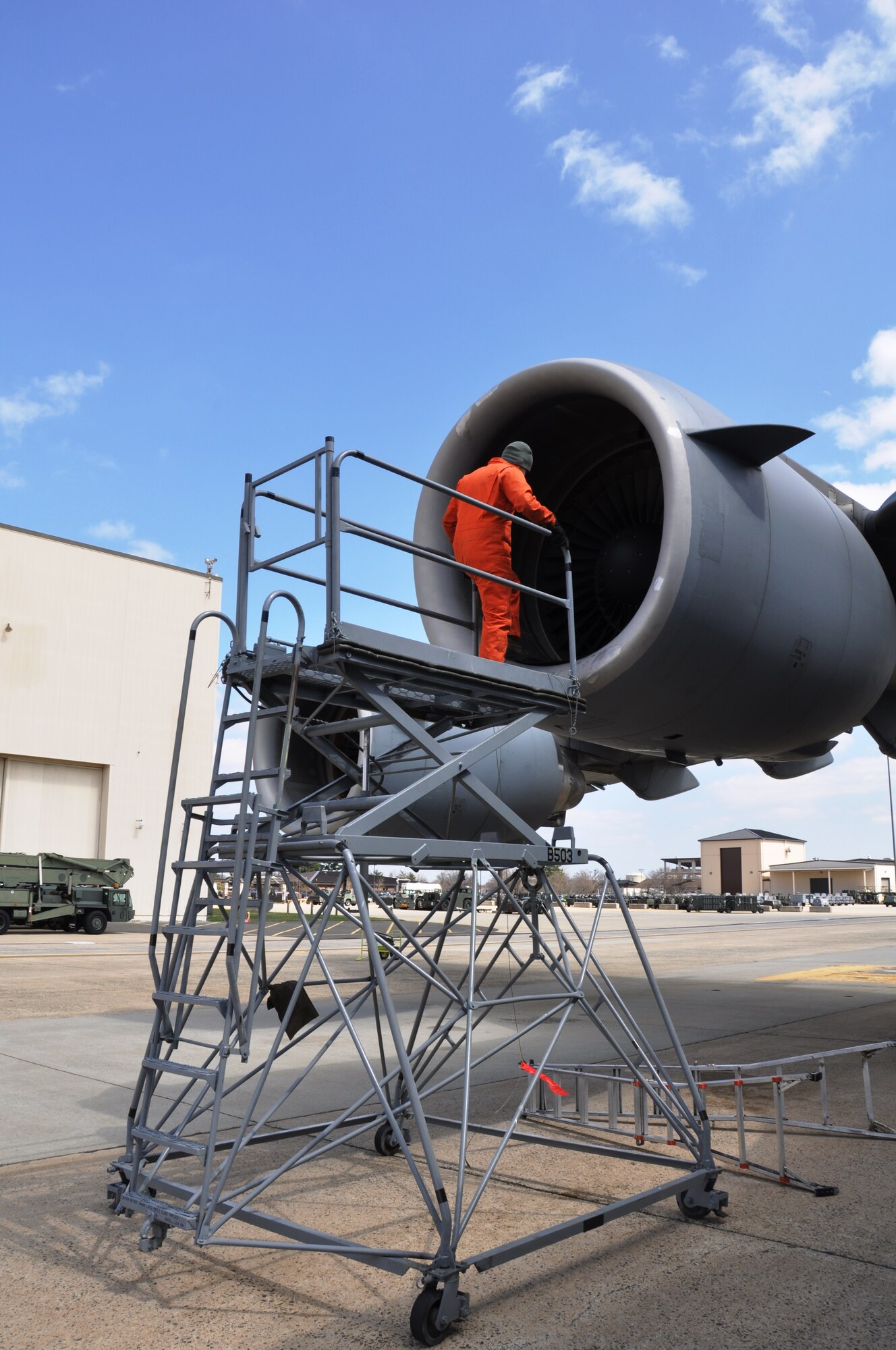 Staff Sgt. Hector Martinez, 514th Aircraft Maintenance Squadron aerospace propulsion technician, conducts a routine inspection on the engine blades of a C-17 Globemaster III aircraft here April 5 (U.S. Air Force photo/Senior Airman Chelsea Smith).