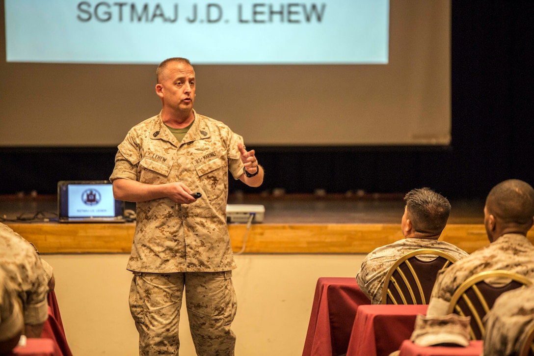 Sgt. Maj. Justin LeHew leads a group discussion April 1 during an E-8 seminar at the Palms on Camp Hansen. Staff members with the Staff Noncommissioned Officer Academy Okinawa hosted the seminar to provide a forum for discussion of current leadership challenges faced by Marines. LeHew is the sergeant major of Training and Education Command, Headquarters Marine Corps. 