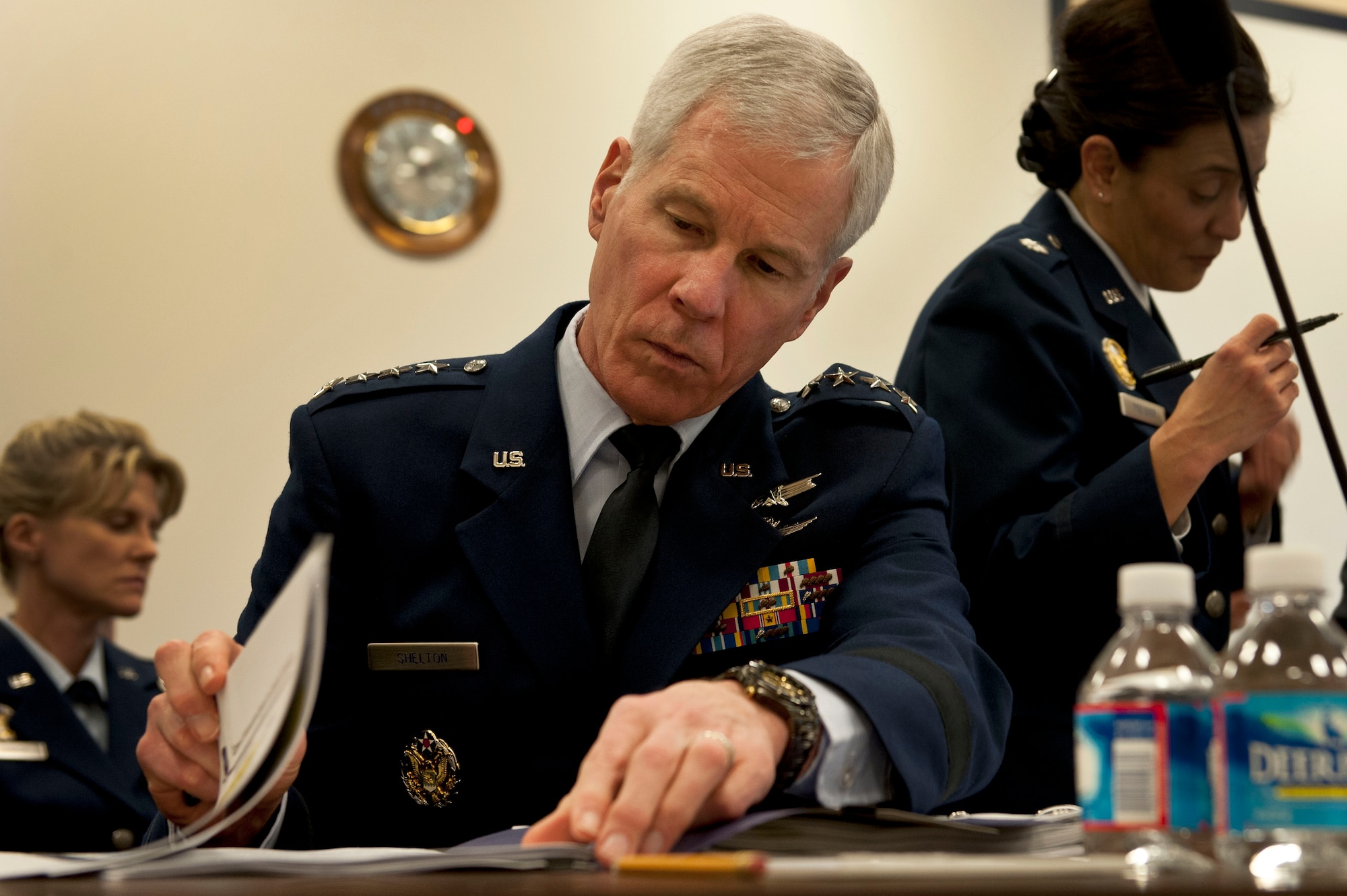 Gen. William Shelton reviews his notes before testifying April 3, 2014, in front of the House Armed Services Committee subcommittee on strategic forces, in Washington, D.C. Shelton is the Air Force Space Command commander, Peterson Air Force Base, Colo. (U.S. Air Force photo/Staff Sgt. Carlin Leslie)