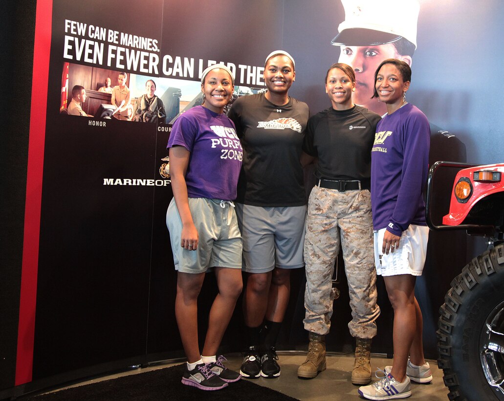 Marines provide mentorship and motivation at the Women's Basketball Coaches Association in Nashville, Tennessee, April 6, 2014.

