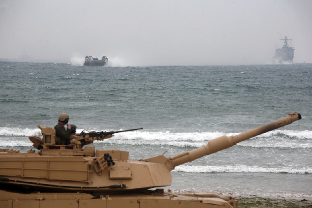 A U.S. Navy Landing Craft Air Cushion ship is in route to transport a U.S. Marine M1A1 Abrams tank that belongs to Company C, 4th Tank Battalion, 4th Marine Division, for exercise Ssang Yong 2014 in Dogue, Republic of Korea April 3. Ssang Yong demonstrates the ROK-U.S. Navy and Marine Corps' responsive amphibious and expeditionary capabilities from the sea. Forward-deployed and forward-based U.S. Marine forces, in conjunction with U.S. allies, have the unique ability to provide rapid force deployment for the full range of military operations, specifically in the Pacific region. 