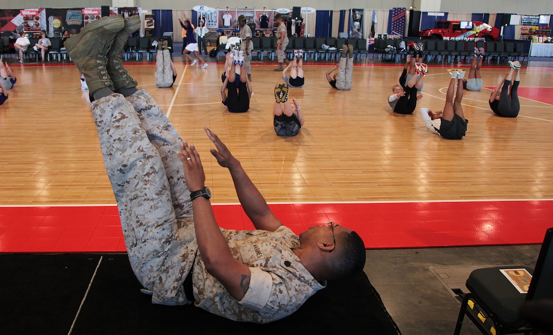 Marines provide mentorship and motivation at the Women's Basketball Coaches Association in Nashville, Tennessee, April 6, 2014. The Marine Corps participation provided WBCA members with an opportunity to engage with Marines in different athletic sessions that promote leadership, unit cohesion and physical fitness. 

