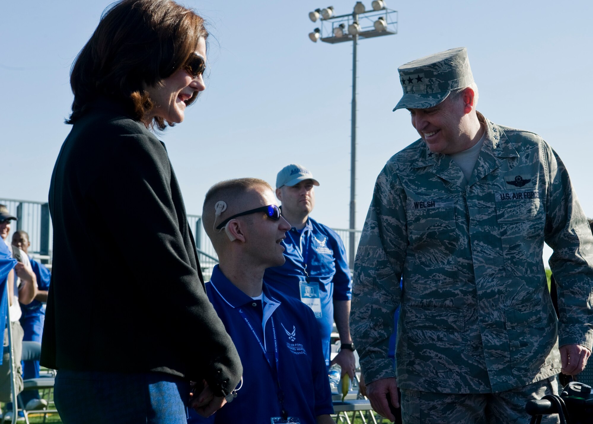 Air Force Chief of Staff Gen. Mark A. Welsh III and his wife, Betty Welsh, speak with Jeremiah Means, April 7, 2014, at Nellis Air Force Base, Nev. Means is a participant in the Air Force Wounded Warrior Trials. The trials will feature seven events to include archery, basketball, cycling, track and field, swimming, shooting and volleyball. (U.S. Air Force photo/Senior Airman Jason Couillard)
