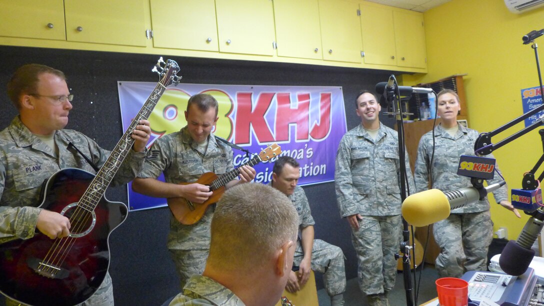 UTULEI BEACH, American Samoa-- The members of Small Kine appeared for a live radio performance on 93 KHJ March 27, 2014.  The broadcast reached 25,850 people on American Samoa.   (US Air Force Photo/ TSgt Michael Smith/ Released)