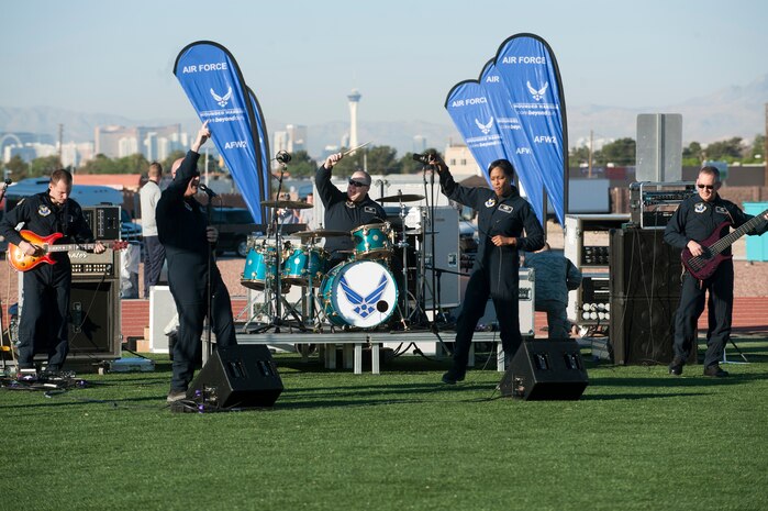 The Air Force Band “Max Impact” performs during the Air Force Wounded Warrior Trials opening ceremony April 7, 2014, at Nellis Air Force Base, Nev.  The goal of the Air Force Wounded Warrior Trials is to identify the most skilled wounded warrior athletes to participate in the Wounded Warrior Games later this year.  (U.S. Air Force Photo by Airman 1st Class Jake Carter)