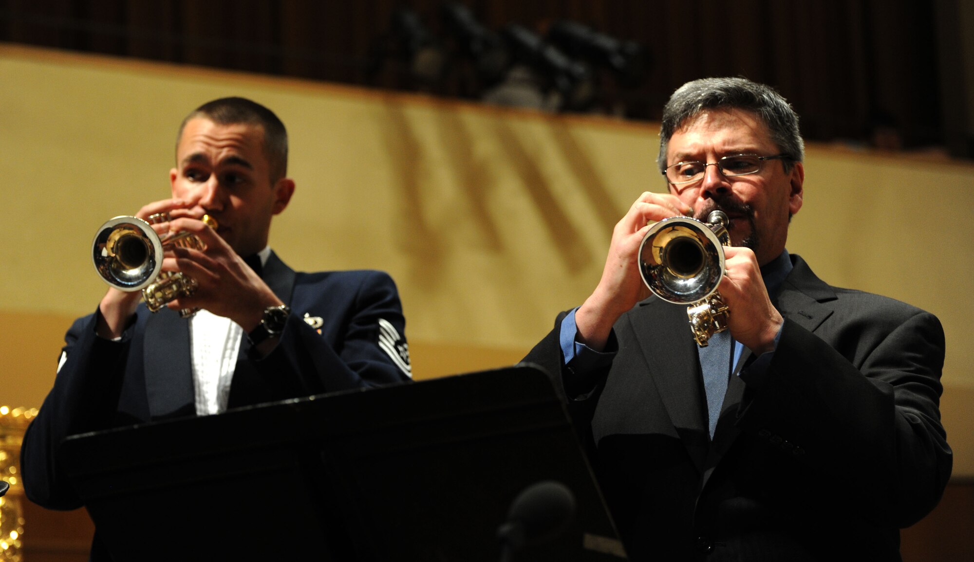 Tech. Sgt. Kristopher Westrich and Robert Sullivan play Antonio Vivaldi’s Concerto for Trumpet in C Major during a performance by the U.S. Air Force Band at Northwestern University in Evanston, Ill., April 6, 2014. Westrich is a trumpeter with the Concert Band and a graduate of Northwestern University. Sullivan, a former Air Force bandsman, is the professor of trumpet at Northwestern University. (U.S. Air Force photo/Master Sgt. Tammie Moore)