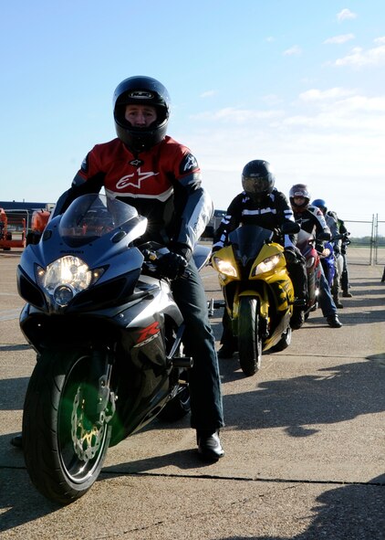 Motorcycle enthusiasts prepare to participate in the Thunder on the Bayou motorcycle ride on Barksdale Air Force Base, La., April 4, 2014. The event promoted Barksdale motorcycle enthusiasts to learn about proper motorcycle safety and personal protective equipment while also encouraging mentorship and camaraderie. (U.S. Air Force photo/Senior Airman Joseph A. Pagán Jr.)