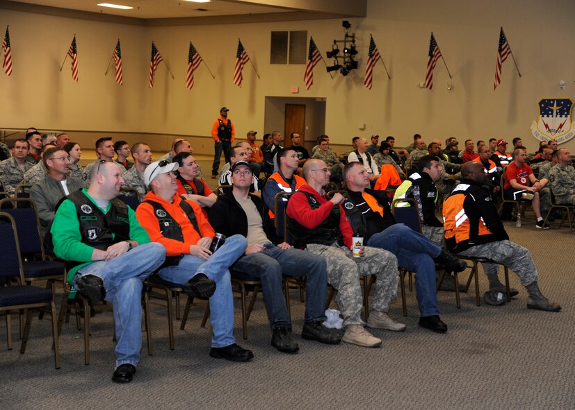 Motorcycle enthusiasts are briefed on motorcycle safety during the Thunder on the Bayou safety event at Barksdale Air Force Base, La., April 4, 2014. Motorcycle riders are required to receive an annual safety briefing. The briefing covers mishap trends, proper usage of personal protective equipment and local road conditions. (U.S. Air Force photo/Senior Airman Joseph A. Pagán Jr.)