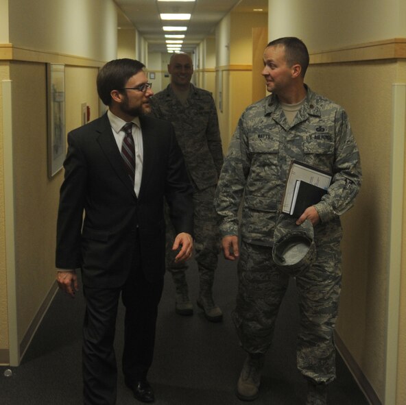 The Honorable Dr. Jamie Morin converses with Maj. Kevin Watts at Fairchild Air Force Base, Wash., April 1, 2014.  Morin visited Fairchild to observe the rollout of the Defense Enterprise Accounting and Management System.  Morin is the Assistant Secretary of the Air Force, Financial Management and Comptroller, and Watts is the 92nd Comptroller Squadron commander.  (U.S. Air Force photo by Airman 1st Class Sam Fogleman/Released)