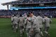 Airmen from Whiteman Air Force Base, Mo., exit the field at Kauffman Stadium after a flag detail during the Kansas City Royals season opener April 4, 2014. The Royals defeated the Chicago White Sox 7-5. (U.S. Air Force photo by Airman 1st Class Joel Pfiester/Released)