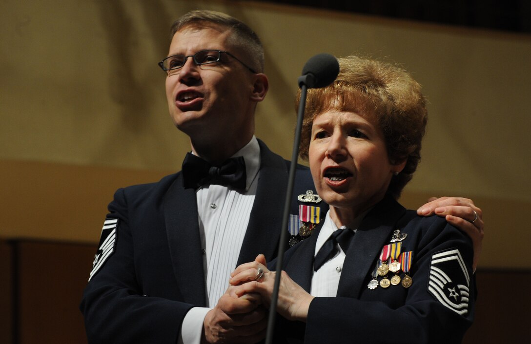 Senior Master Sergeants Ryan Dolan and Linda Waring sing a duet during The U.S. Air Force Band’s performance at Northwestern University in Evanston, Ill., April 6, 2014.  Waring, a native of Hagerstown, Md., is an alto vocalist with the Singing Sergeants, the official chorus of the U.S. Air Force. Dolan, a native of Virginia Beach, Va., is a bass vocalist with the Singing Sergeants. (U.S. Air Force photo/Master Sgt. Tammie Moore)