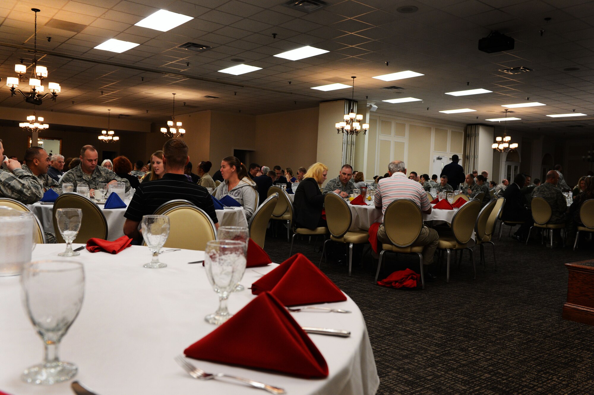 Approximately 100 Airmen and civilians gathered at the Carolina Skies Club for a volunteer appreciation breakfast at Shaw Air Force Base, S.C., April 7, 2014.  During the event, guest speaker retired Chief Master Sgt. Lefford Fate spoke as well as Col. Clay Hall, 20th Fighter Wing commander, while attendees ate their breakfast. (U.S. Air Force photo by Airman 1st Class Jensen Stidham) 