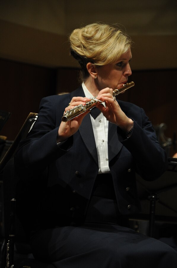 Senior Master Sgt. Stacy Newbrough Ascione performs with the U.S. Air Force Band at Northwestern University in Evanston, Ill., April 6, 2014.  Ascione, a native of Iowa City, Iowa, is a flautist  with the Concert Band, the Band’s largest ensemble. (U.S. Air Force photo/Master Sgt. Tammie Moore)