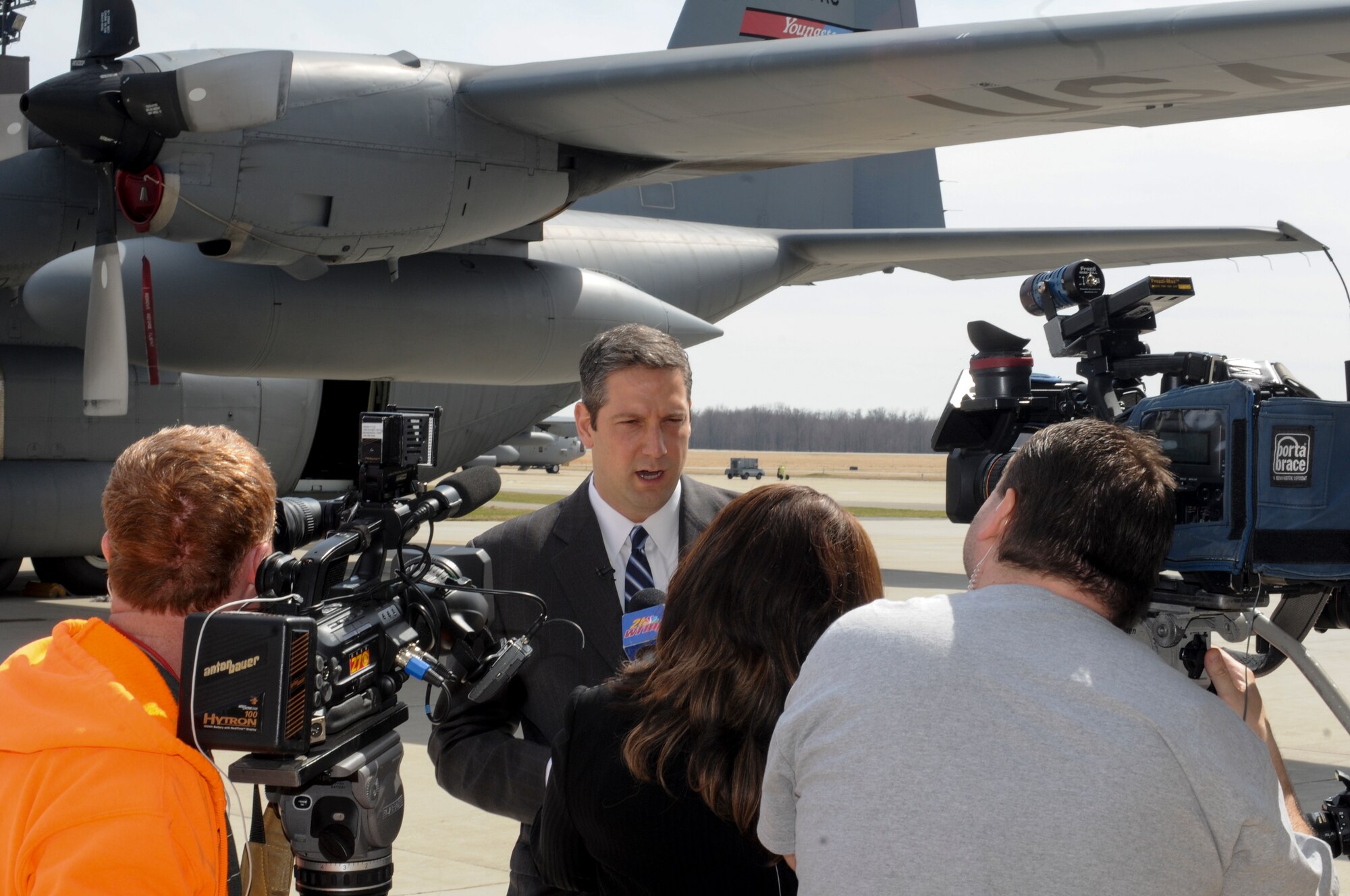 Congressman Tim Ryan of Ohio’s 13th district is interviewed by local media personnel while standing in front of a Youngstown Air Reserve Station C-130 Hercules aircraft here, April 6, 2014. Ryan was a distinguished guest at the deactivation ceremony for the 773rd Airlift Squadron. The 773rd Airlift Squadron, which was activated as a unit of the 910th Airlift Wing in 1995, was officially deactivated on March 31. The deactivation resulted from Air Force structure changes that reduced the 910th’s C-130 aircraft fleet to eight Primary Assigned Aircraft and on Back-up Inventory Aircraft. U.S. Air Force photo/Senior Airman Rachel Kocin.