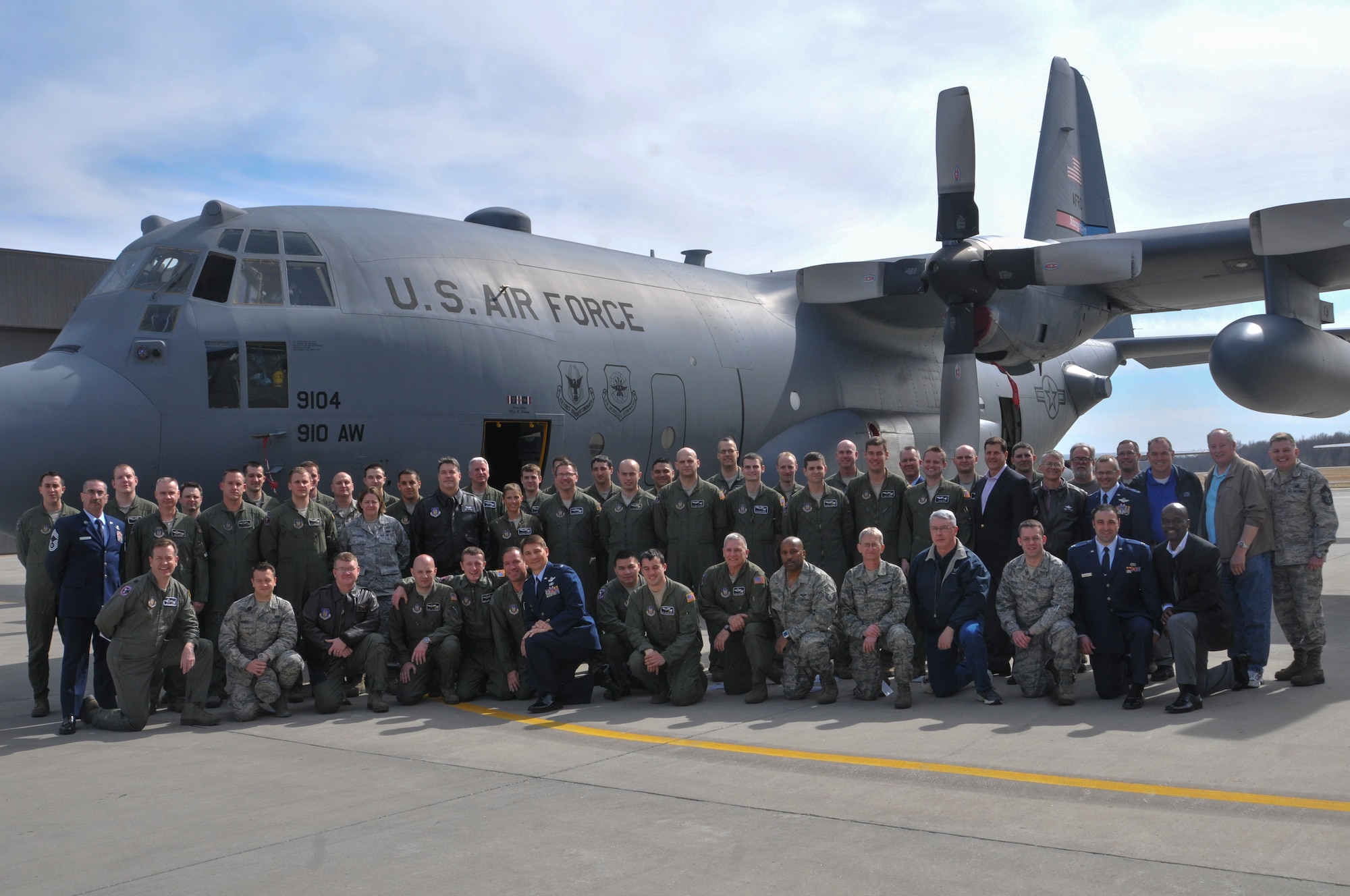 Past and present members of the 773rd Airlift Squadron pose in front of a C-130 Hercules aircraft here, April 6, following the unit’s deactivation ceremony. The squadron, which was activated as a unit of the 910th Airlift Wing in 1995, was officially deactivated on March 31. The deactivation resulted from Air Force structure changes that reduced the 910th’s C-130 aircraft fleet to eight Primary Assigned Aircraft and on Back-up Inventory Aircraft. U.S. Air Force photo/Tech. Sgt. Rick Lisum.