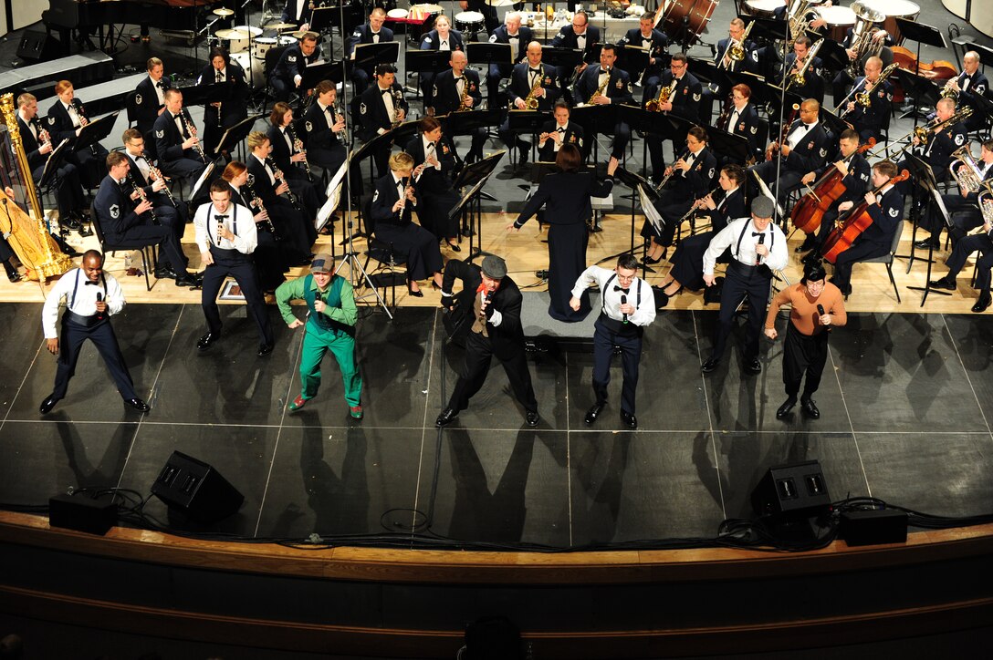 The U.S. Air Force Band's Singing Sergeants perform at Neuqua Valley High School in Naperville, Ill, April 5, 2014. This performance is part of their 2014 Spring Tour across the Midwest. The bandsmen prepared two destination-themed programs for the tour including opera and Broadway vocal features to perform as they travel through three Midwestern states.  (U.S. Air Force photo/Airman 1st Class Joshua R. M. Dewberry)