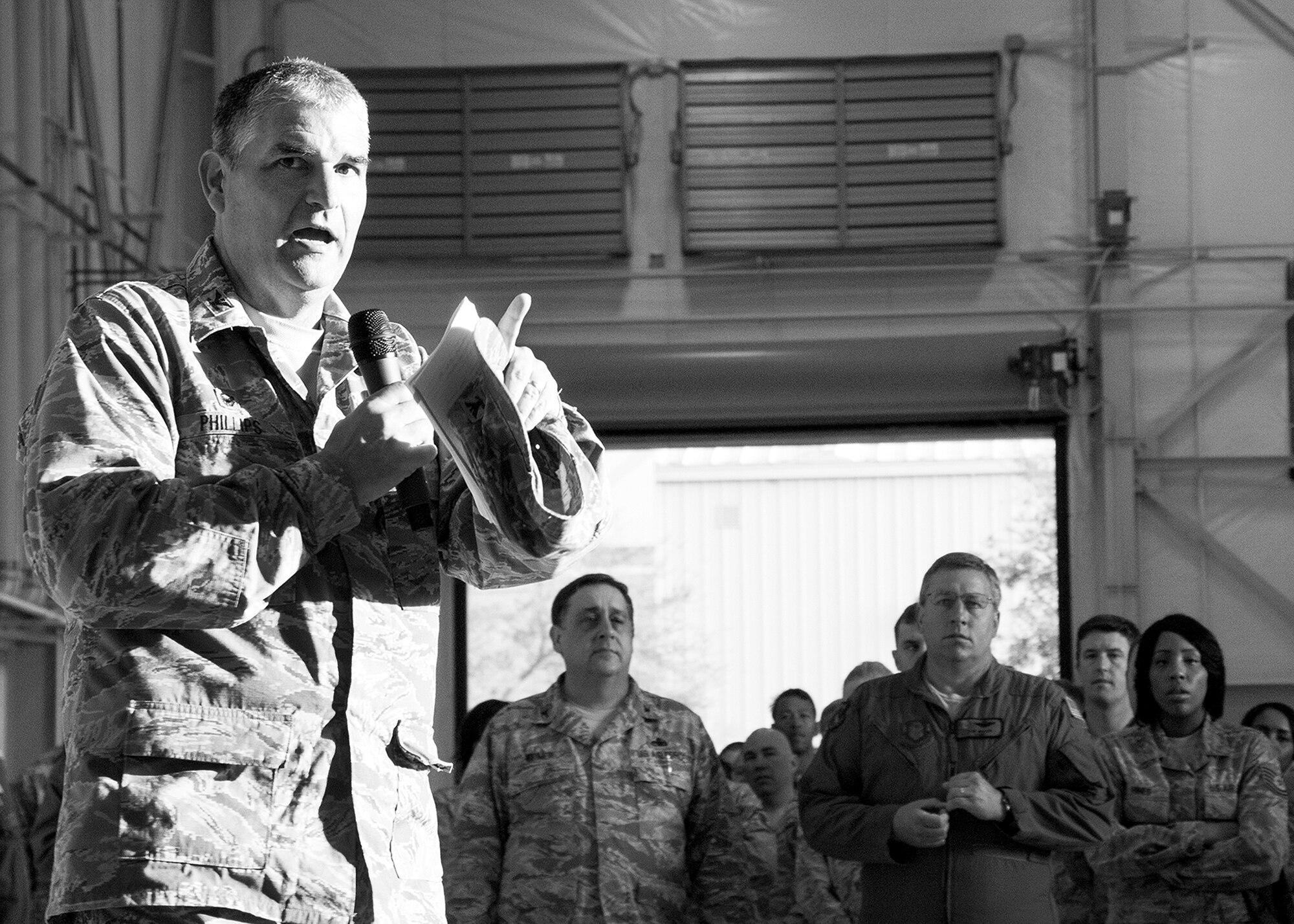 Col. James M. Phillips, commander of the 919th Special Operations Wing, speaks to his wing during the wingman kick-off April 4, at Duke Field Fla.  Afterward, Duke Airman participated in group discussions that covered topics such as mental, physical, and spiritual health.  (U.S. Air Force photo by Tech. Sgt. Jasmin Taylor)