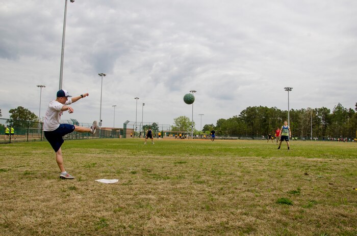 A servicemember tries to get on base during the Sexual Assault Prevention and Response program kickball tournament April 5, 2014, at Locklear Park on Joint Base Charleston – Weapons Station, S.C.  More than 30 teams participated in the kickball tournament which was part of Sexual Assault Awareness Month and provided servicemembers the opportunity to support the Sexual Assault Prevention and Response program. Strictly Business beat 36 other teams to become the third annual kickball tournament champions. (U.S. Navy photo/Petty Officer 3rd Class Jason Pastrick)