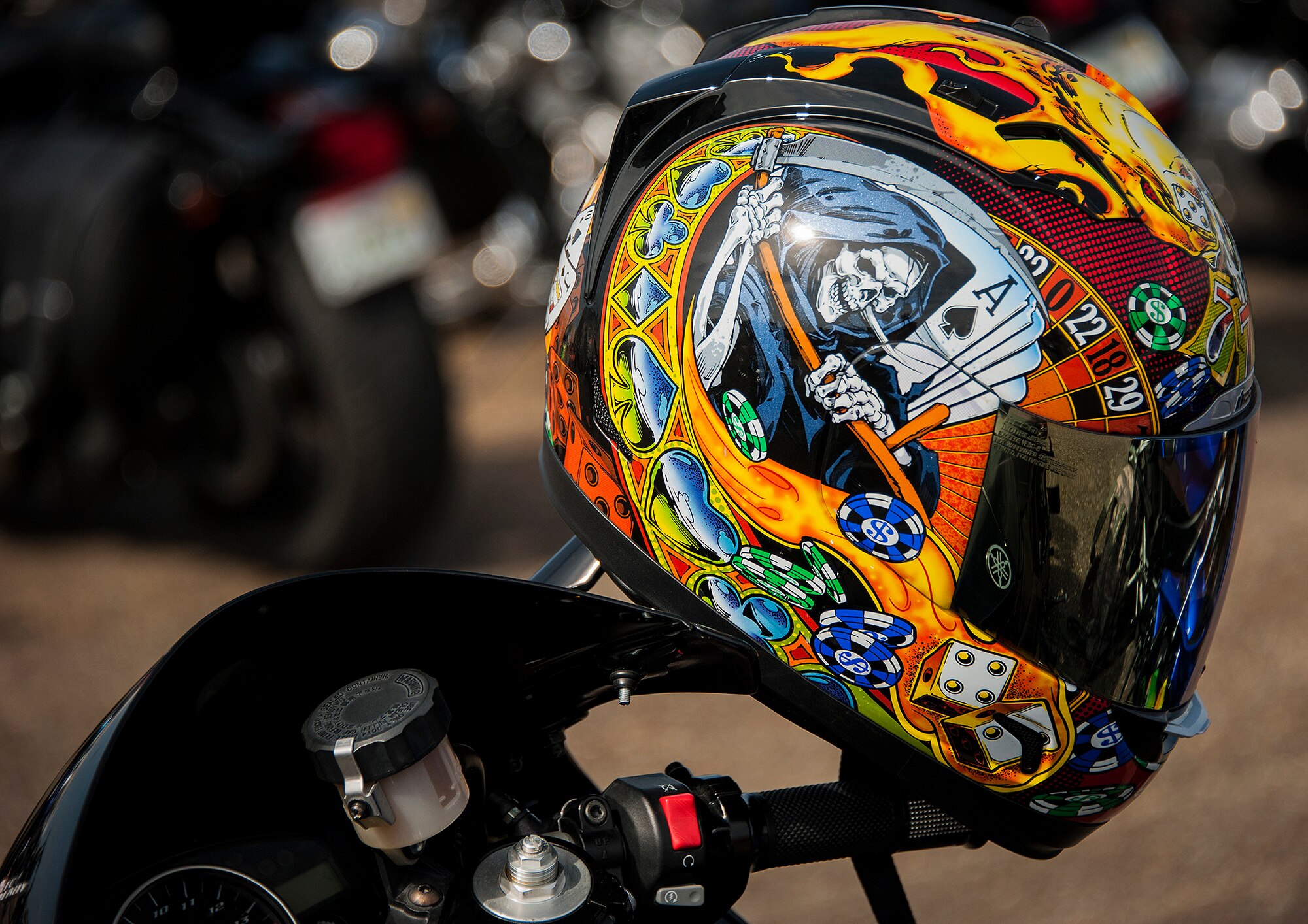 Plenty of colorful gear and bikes were on display at the seventh annual motorcycle safety rally April 4, at Eglin Air Force Base, Fla.  More than 450 bikers attended to hear briefings on motorcycle law, safety regulations and tips on how to be more informed and aware rider.  (U.S. Air Force photo/Sara Vidoni)