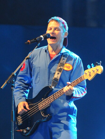 Dave Poche plays bass during his performance with the Imagination Movers April 4, 2014, at RAF Mildenhall, England. The Imagination Movers are an entertainment group whose show is featured on the Disney Junior television channel. The artists were at RAF Mildenhall performing for a Navy Entertainment and Armed Forces Entertainment tour. (U.S. Air Force photo by Tech. Sgt. Neal X. Joiner/Released)