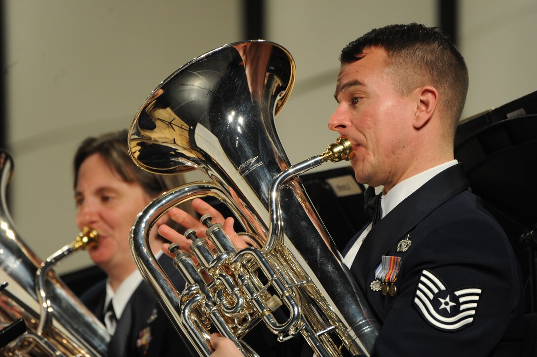 Tech. Sgt. Joseph M. Bello performs during a concert featuring the U.S. Air Force Band’s Concert Band and the Singing Sergeants at his alma mater, Neuqua Valley High School, in Naperville, Ill., April 5, 2014. In addition to his performance duties as an euphoniumist, Bello is director of tours for the Concert Band (U.S. Air Force photo/Master Sgt. Tammie Moore)