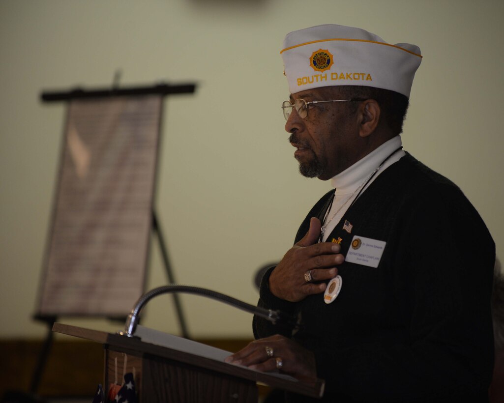 Dr. Dennis Edwards, American Legion Post 22 chaplain, leads the invocation during the 2nd Annual Welcome Home Vietnam Veterans event at the American Legion Post 22 in Rapid City, S.D., March 29, 2014. During the event, base and community leaders their showed support to veterans of the Vietnam War and thanked them for their service. (U.S. Air Force photo by Airman 1st Class Rebecca Imwalle/released)
