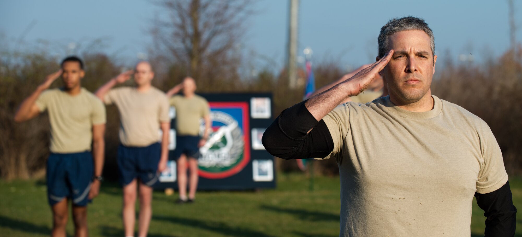 Master Sgt. Shawn Leonard, 4th Air Support Operations Group operations superintendent, renders a salute honoring fallen tactical air control party members March 27, 2014, at Grafenwoehr, Germany. At the end of the memorial run, the Airmen gathered to pay their respect to their fallen brothers. (U.S. Air Force photo/Senior Airman Jonathan Stefanko)