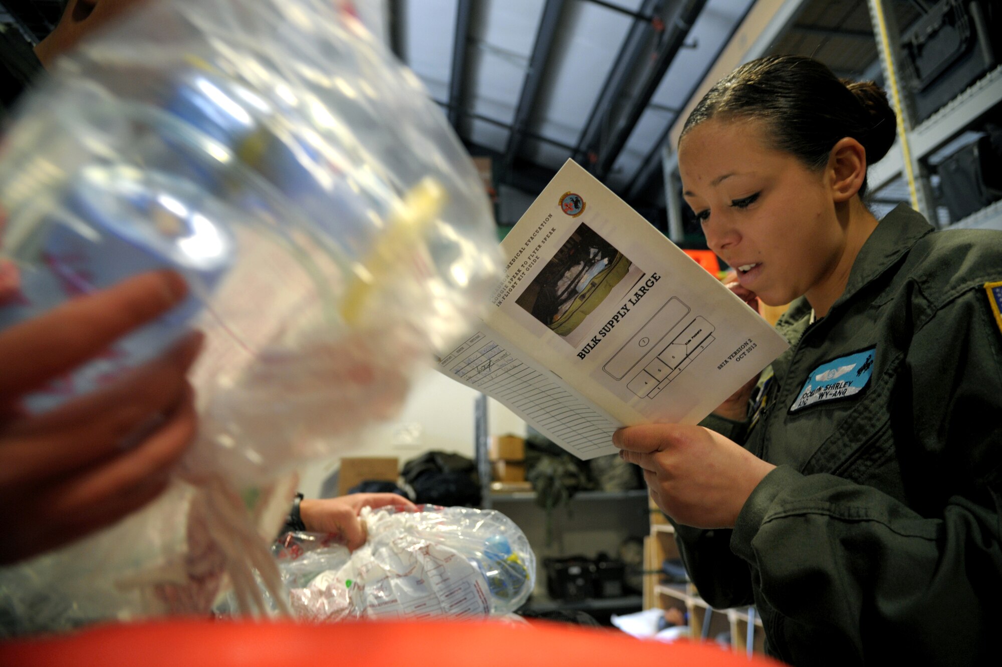 Airman 1st Class Jocelyn Shirley,187th Aeromedical Evacuation Squadron technician, prepares and inspects medical supplies during a national disaster exercise, Ultimate Caduceus 2014, at Cheyenne Air National Guard Base, Wyo., March 30, 2014. During Ultimate Caduceus, part of the Federal Emergency Management Agency's National Capstone Exercise, AE members provided medical support processed and transferred patients. The aeromedical teams were comprised of more than 18 AE crew members from Pope Army Airfield, N.C., Scott AFB, Ill., and Cheyenne ANG Base, Wyo. (U.S. Air Force photo/ Staff Sgt. Stephenie Wade) 