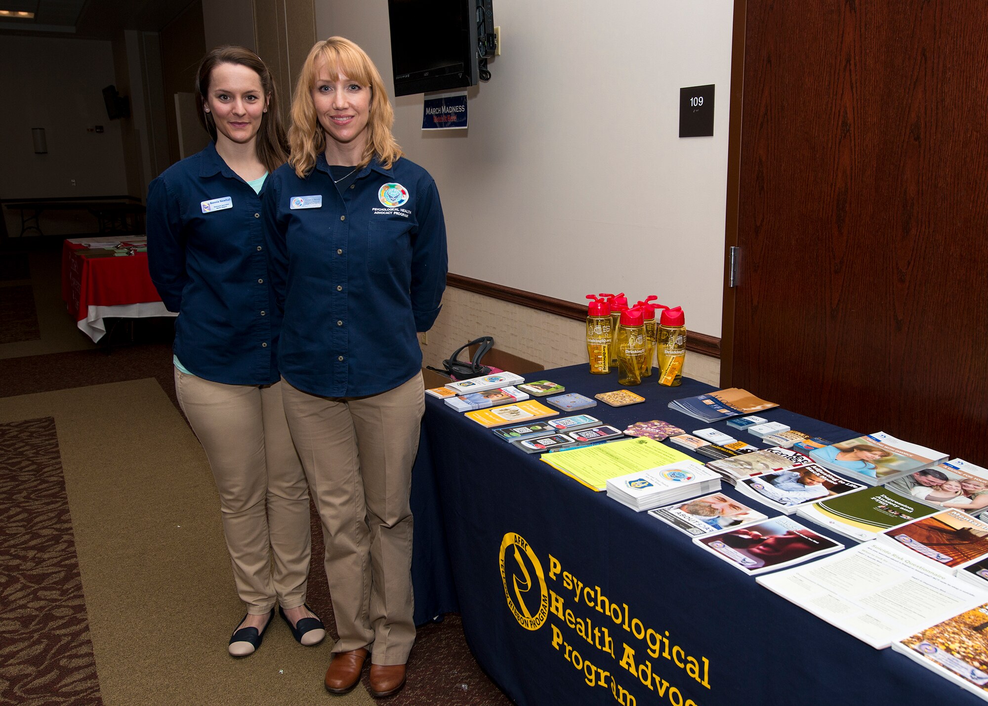 Air Force Reserve Psychological Health Advocate Program Out Reach Specialists Bonnie Newhall (left) and Pamela Boyd host an information table at the Niagara Falls Air Reserve Station Community Activity Center, April 4, 2014.  An Airman or spouse can come to PHAP for any reason and PHAP will work as a conduit to confidentially provide any and all resources that will benefit the Airman or family. (U.S. Air Force photo by Tech. Sgt. Joseph McKee)