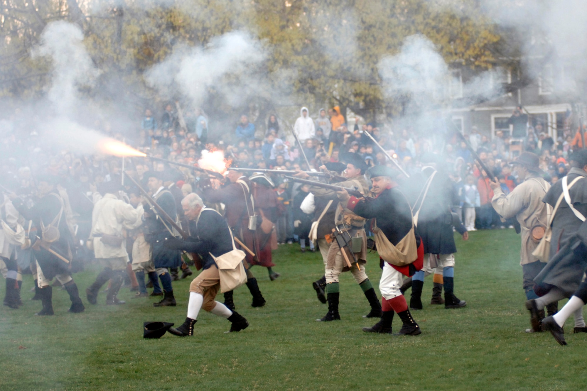 LEXINGTON, Mass. – Colonial militia reenact the Battle of Lexington on the Battle Green in 2011 on Massachusetts Avenue and Bedford Street. The Town of Lexington celebrates the first shots of the American Revolution with a reenactment of the early-morning engagement between the town's militia and the British regulars. (File photo by Walter Santos)