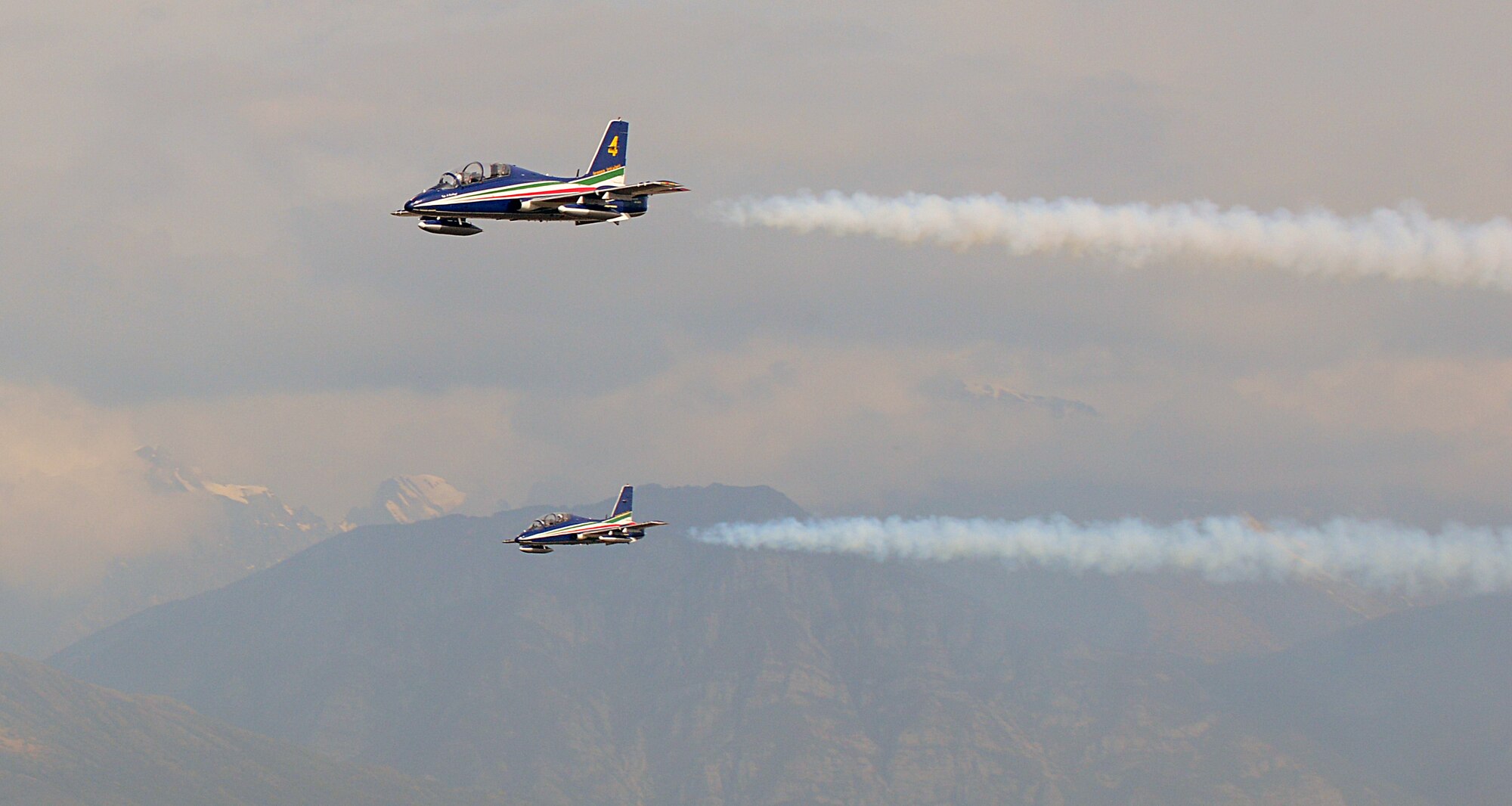 To kick off their 2014 tour, the Italian aerobatic demonstration team, Frecce Tricolori, performed numerous tricks and stunts above Aviano Air Base, Italy, during a pre-tour rehearsal, April 4, 2014. The aerobatic team is comprised of 10 Aermacchi MB-339 PAN aircraft, which are based at Rivolto Air Force Base, in the north-eastern Italian region of Friuli Venezia Giulia, province of Udine. (U.S. Air Force photo/Senior Airman Michael Battles) 