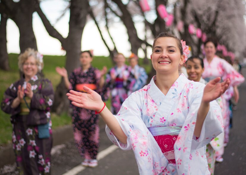 Antavis Geoffroy, a Yokota Air Base spouse performs a tanabata dance in a traditional Japanese Yukata outfit during the Fussa Sakura Festival in Fussa City, Japan, April 6, 2014. Yokota’s Tanabata Dancers perform traditional Japanese dances during festivals in the local community throughout the year. (U.S. Air Force photo by Capt. Raymond Geoffroy)