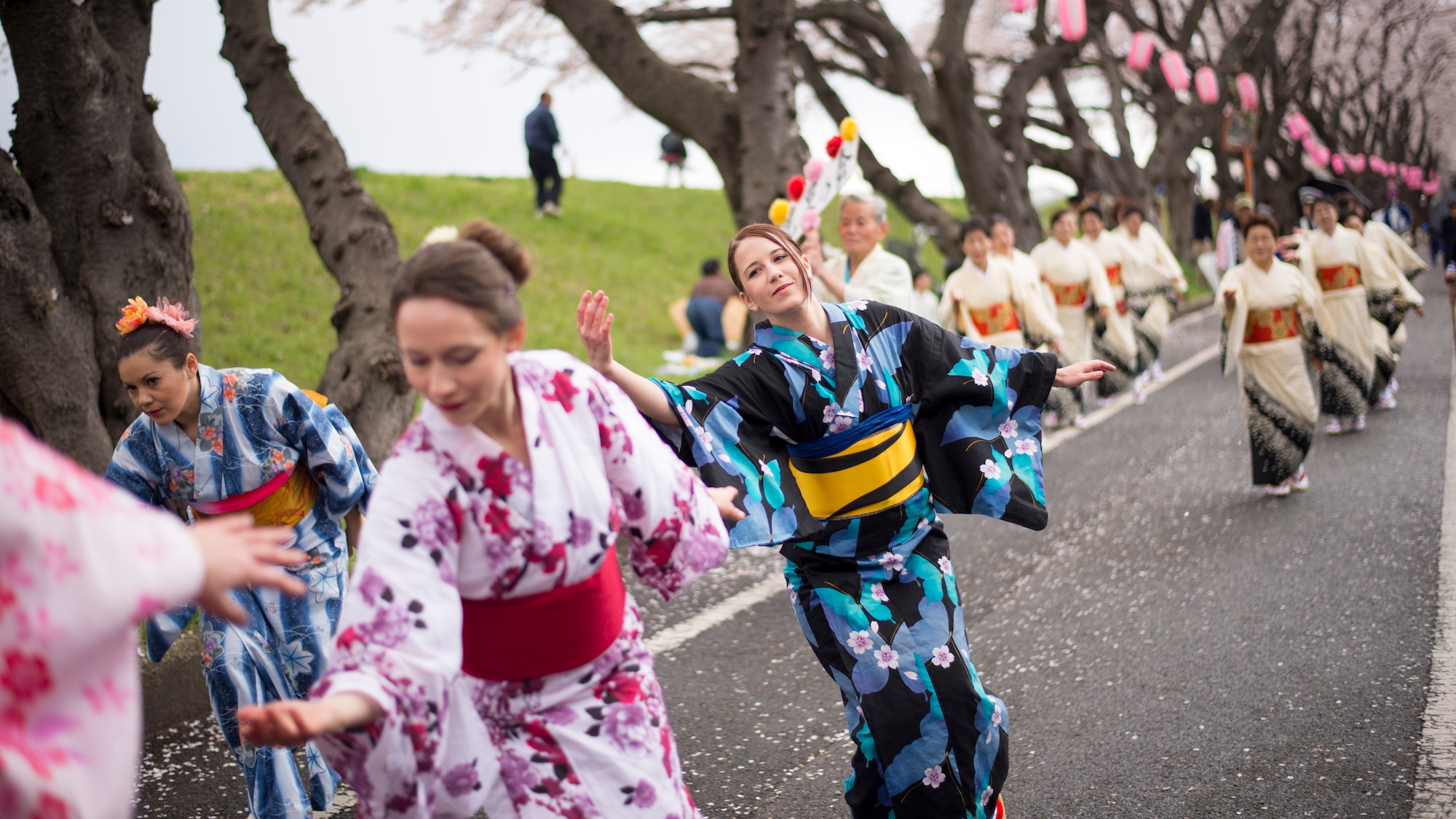 Kat Van Pixteren, a Yokota Air Base spouse performs a tanabata dance in a traditional Japanese Yukata outfit during the Fussa Sakura Festival in Fussa City, Japan, April 6, 2014. Yokota’s Tanabata Dancers perform at local festivals in order to promote goodwill and cultural exchange between the U.S. and Japan. (U.S. Air Force photo by Capt. Raymond Geoffroy)