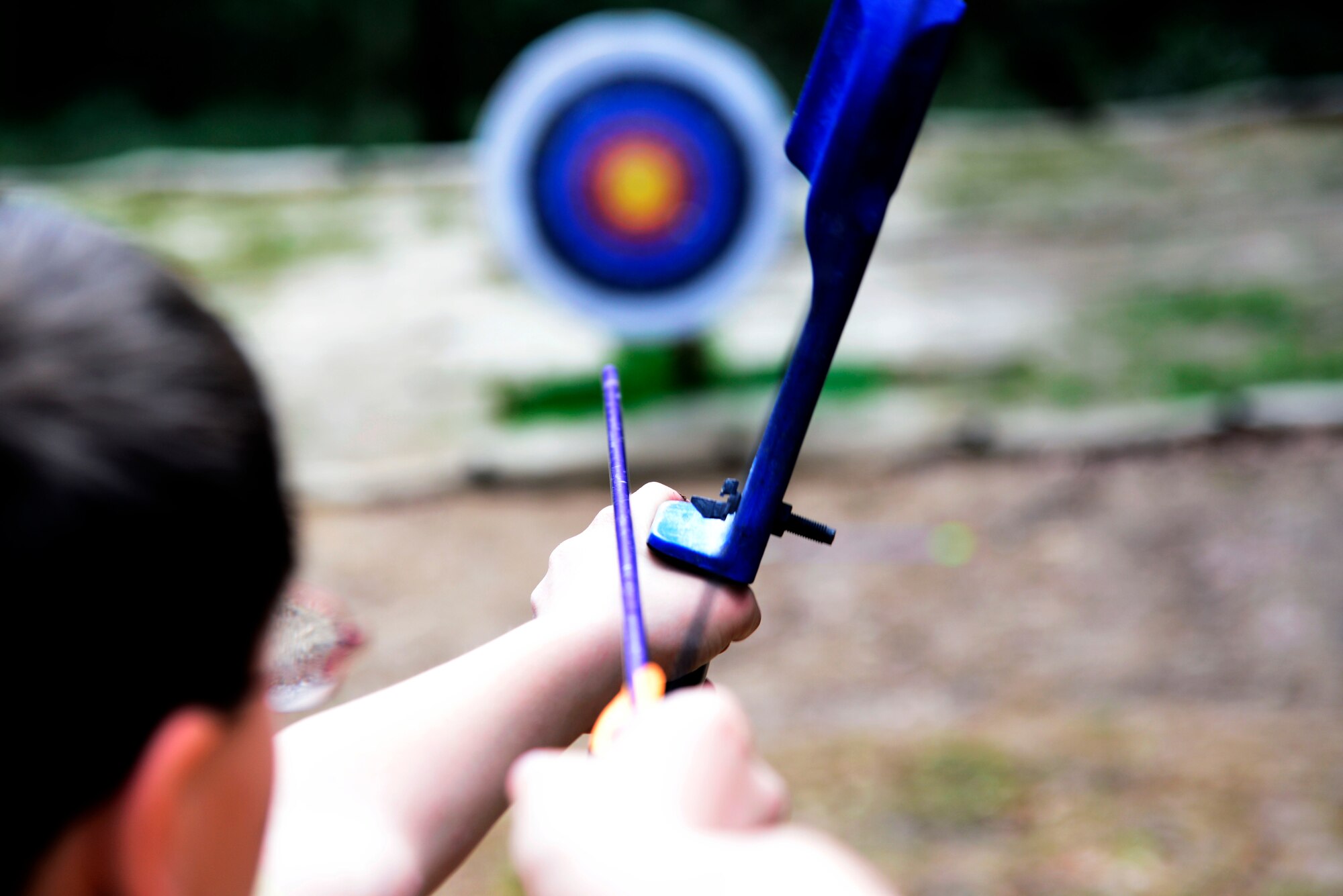 Children practice their archery skills during Kids Understanding Deployment Operations at Tama Hills, Japan, April 4, 2014. Camp KUDOS gave military children the opportunity to experience a deployment process similar to what their parents may go through. ( U.S. Air Force photo by Tech Sgt. Melissa K. Mekpongsatorn/Released)